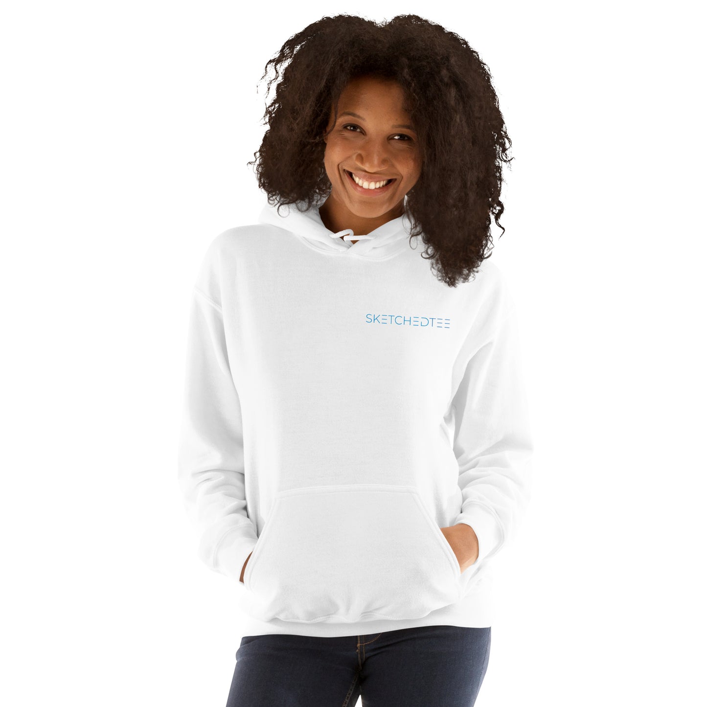 A smiling woman with curly hair wears a cozy white "Just a Girl who Loves Wine" hoodie, featuring small blue text on the front, hands in her pocket, standing against a white background.